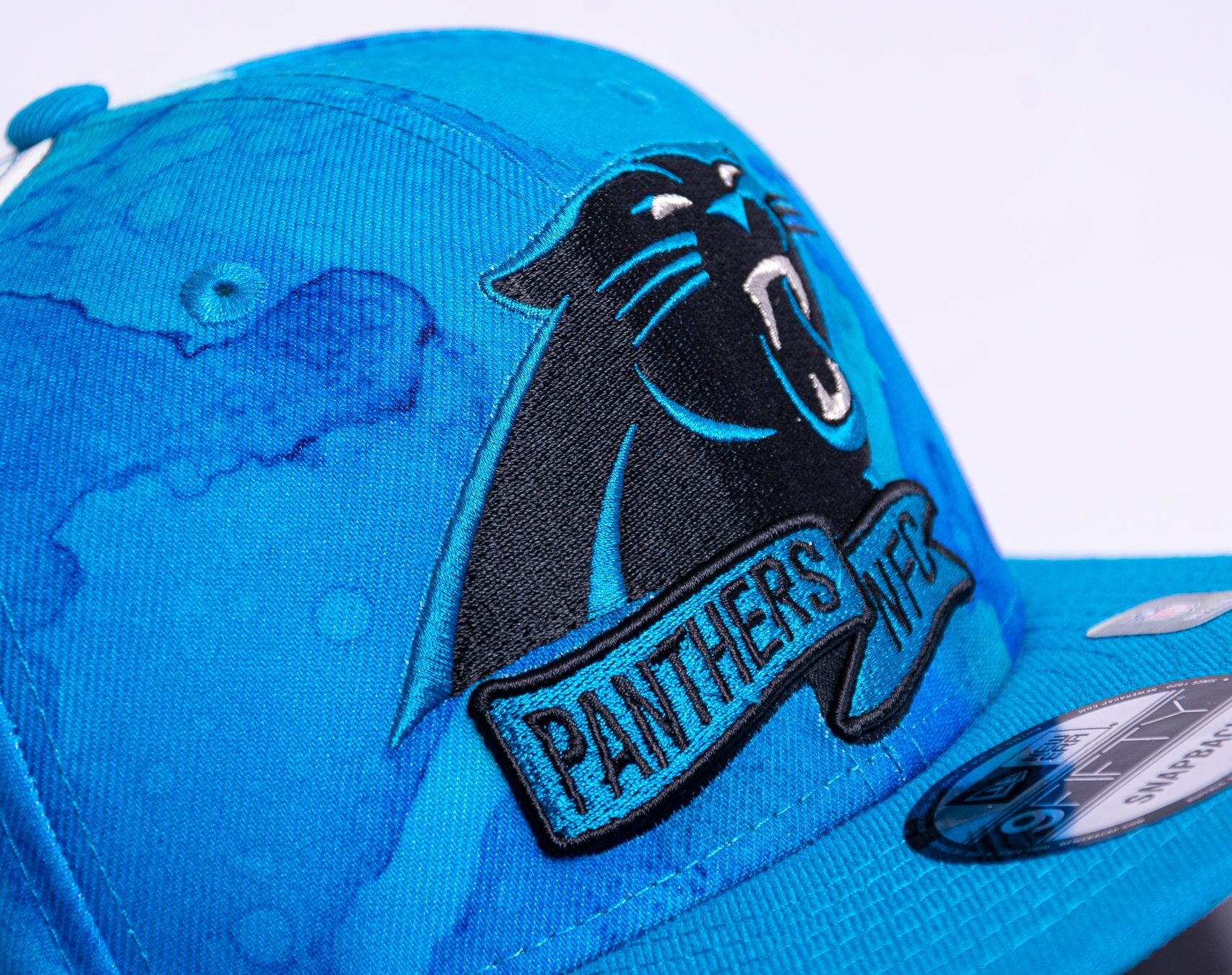 Carolina Panthers New Era 2022 Sideline 9FIFTY Ink Dye Snapback Hat - Blue